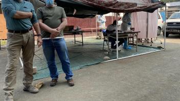 Greg and Joao waiting for another COVID test
