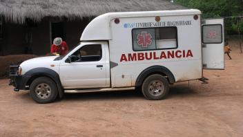 Ambulance on a dirt road