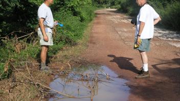 Collecting larvae from site near hospital, on Bubaque.