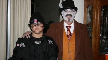Greg and son at Halloween party