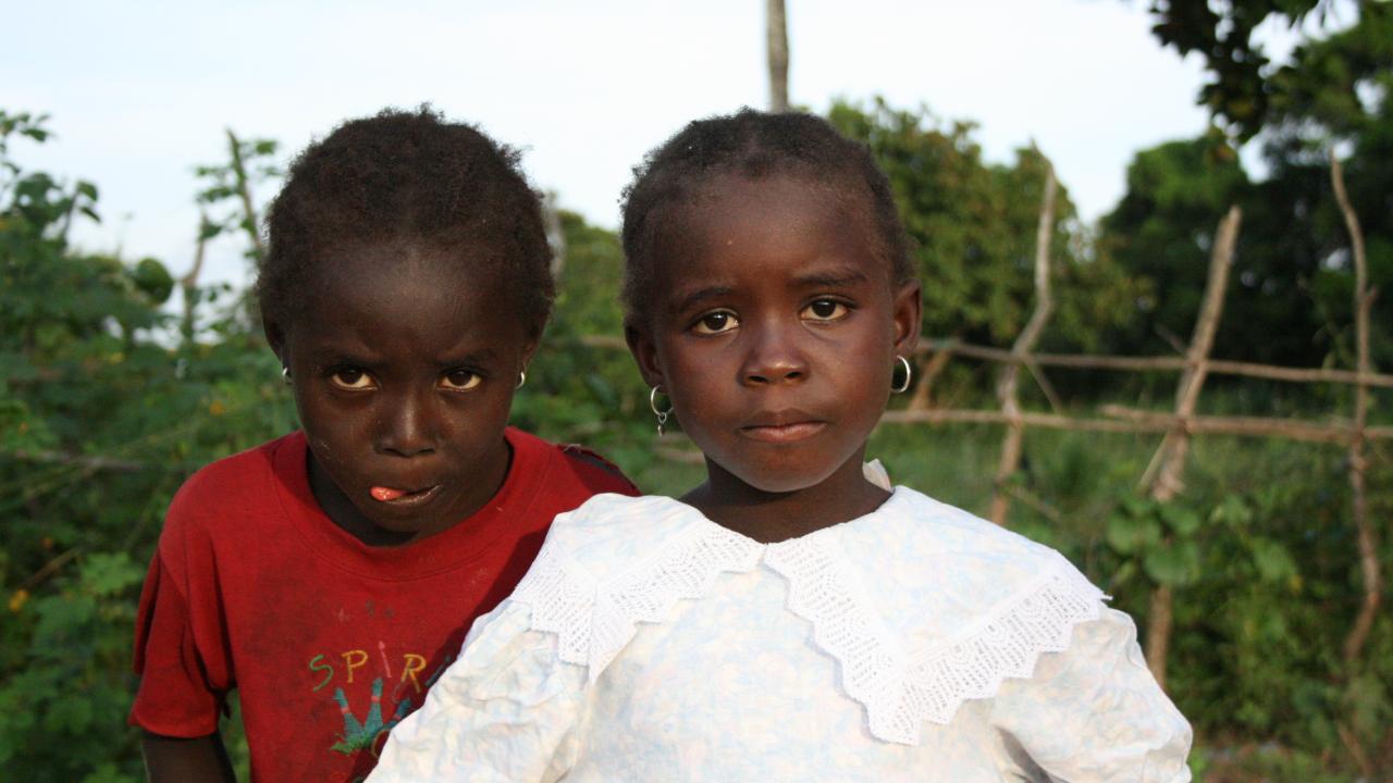 Two young girls making faces for the camera